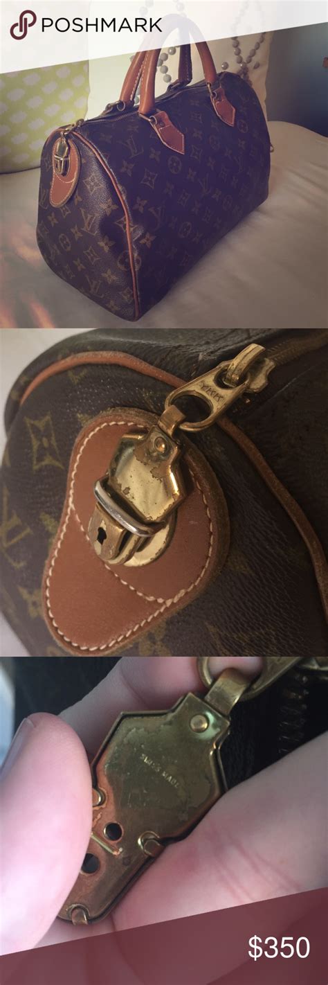 ykk zipper on louis vuitton bag|authentic louis vuitton padlock.